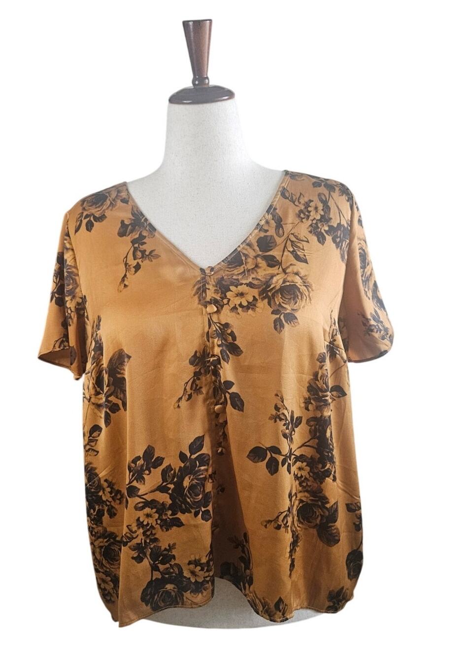 Torrid oral Hi Low Tunic Size 0 L Floral Hi Low Tunic Blouse Tan Black V Neck
